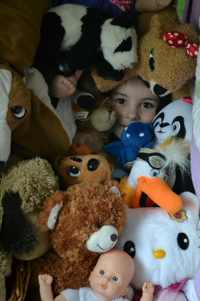 buried in stuffed animals