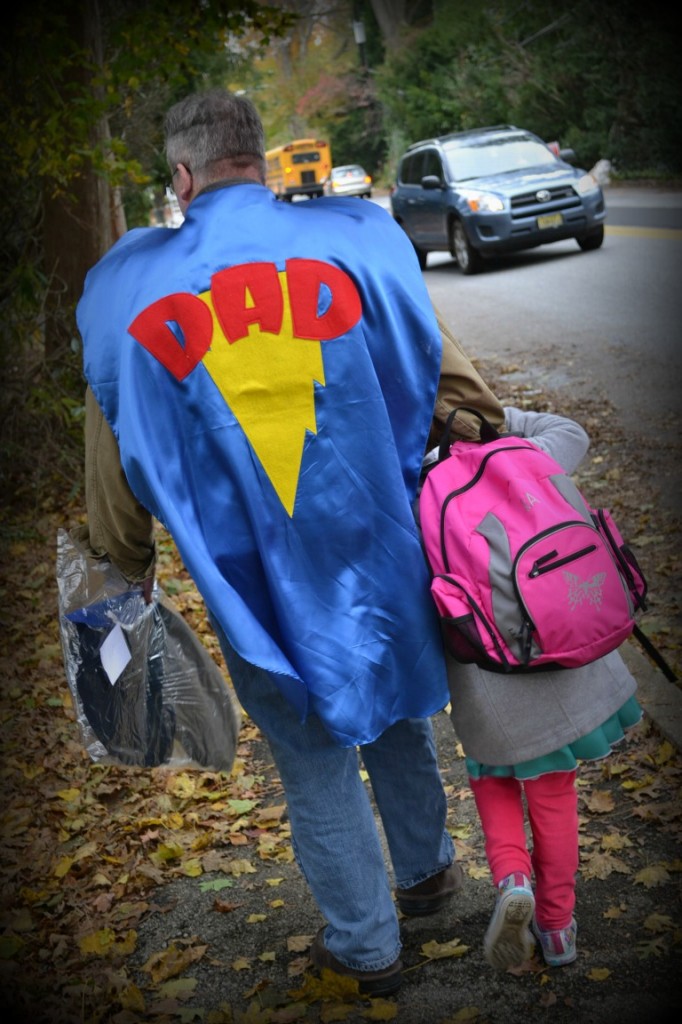 dad in a dad superhero cape