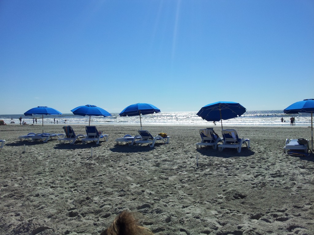 beach at golden inn beach cahirs with umbrellas