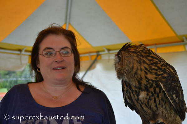 women holding an owl